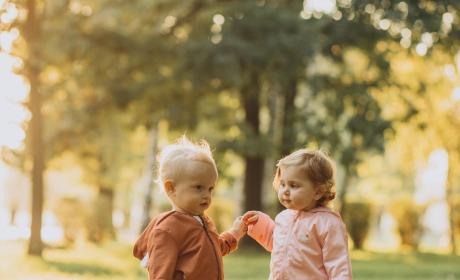 cute-little-boy-and-girl-together-in-autumnal-park.jpg